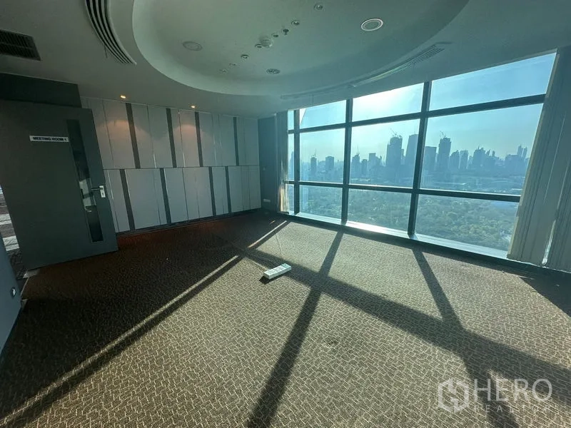 Office Space for rent in Watthana, Bangkok - Conference room with full‑height glass wall overlooking the city and greenery.