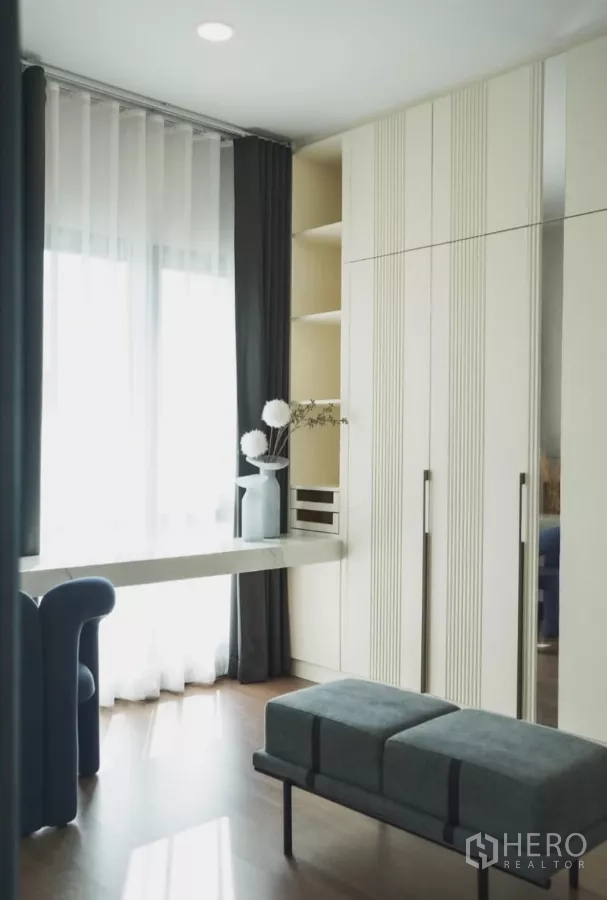 Detached House for rent in Bang Phli, Samut Prakan - Sunlit bedroom with double bed beside full-width glass doors.