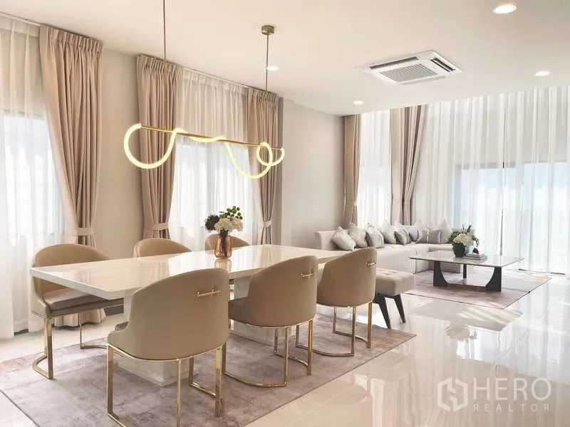 Detached House for rent in Bang Phli, Samut Prakan - Airy dining and living space with glossy floors and full-height windows.