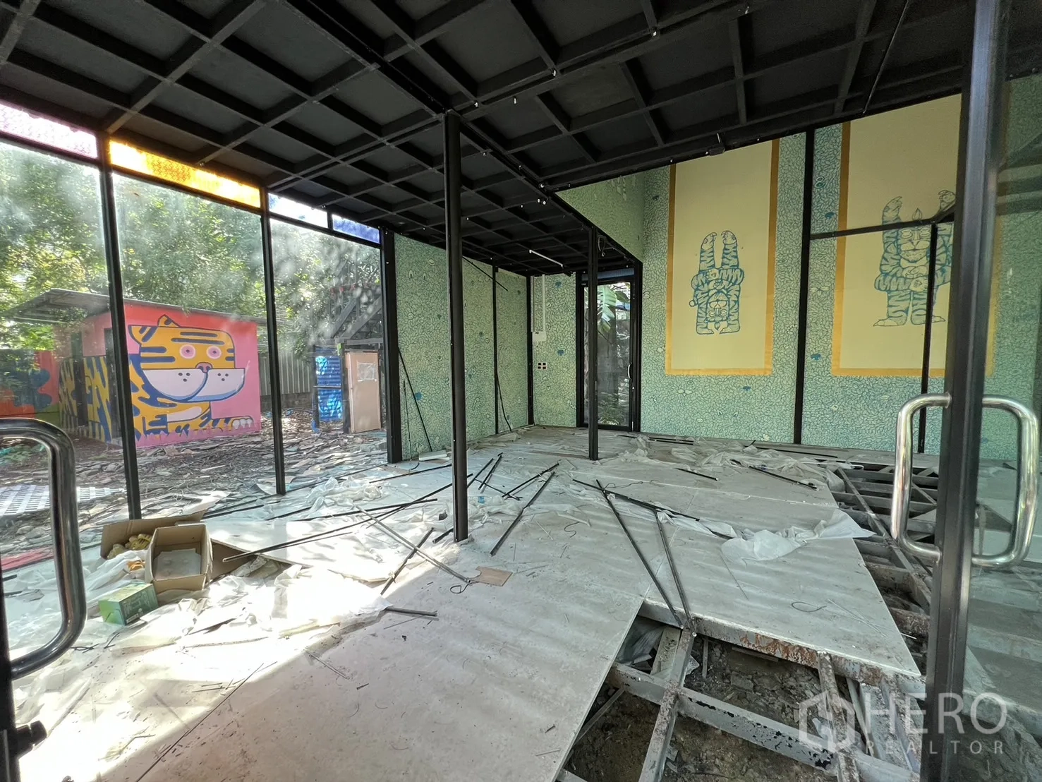 Detached House for rent in Watthana, Bangkok - Narrow covered balcony with metal railing and roof.