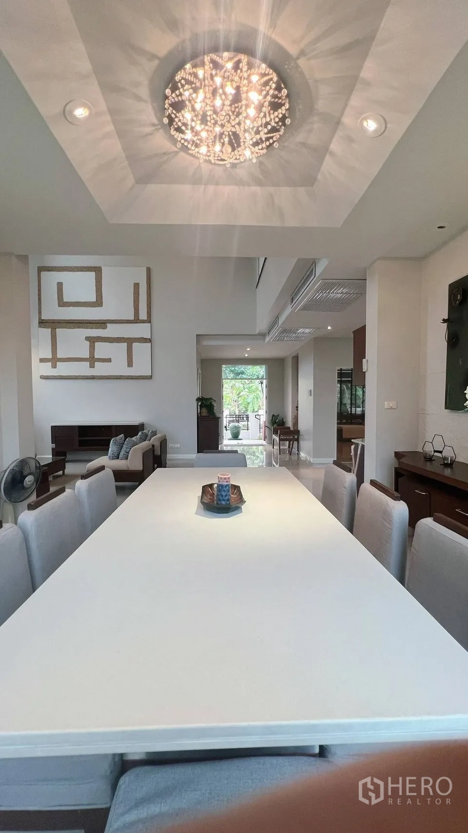 Detached House for rent in Lat Krabang, Bangkok - Elegant dining space under a sparkling ceiling light.