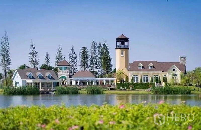 Detached House for rent in Bang Bo, Samut Prakan - Lakeside clubhouse with tower, landscaped gardens and a waterfront view.