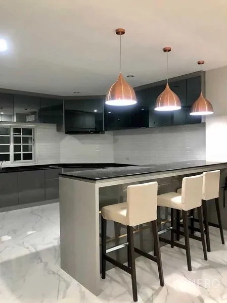 Home Office for rent or sale in Pak Kret, Nonthaburi - Modern kitchen with breakfast bar, copper pendant lights and marble-look flooring.