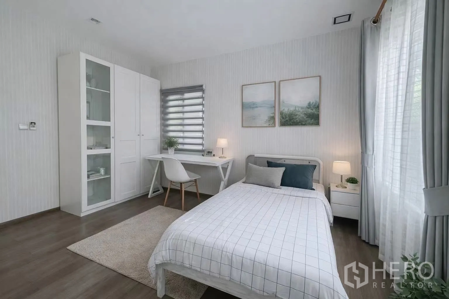 Detached House for rent or sale in Bang Phli, Samut Prakan - Guest bedroom with single bed, desk, wardrobe, and large windows.