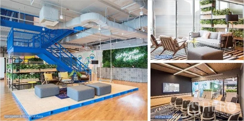 Office Space for rent in Sathon, Bangkok - Colorful reception and breakout areas with a blue staircase, lounge seating and an adjacent meeting room.