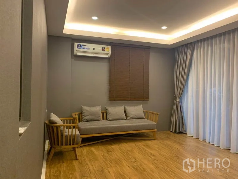 Detached House for rent - Upstairs family room with wood flooring, gray walls and cove lighting.