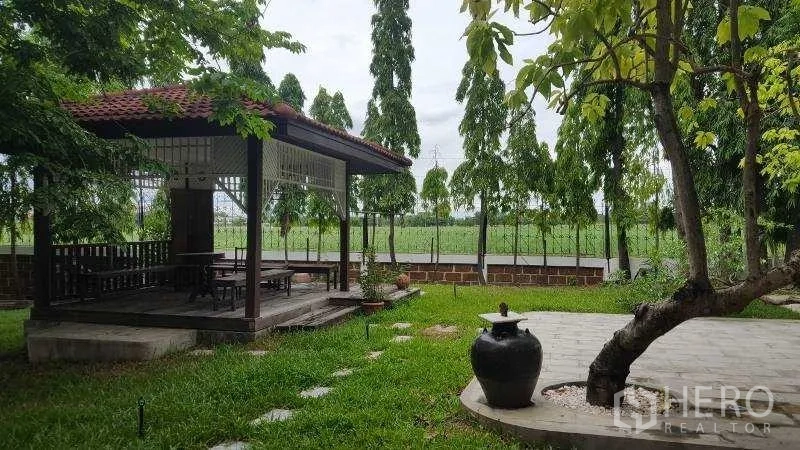 Detached House for rent in Bang Phli, Samut Prakan - Traditional gazebo set in a landscaped garden with green lawn.