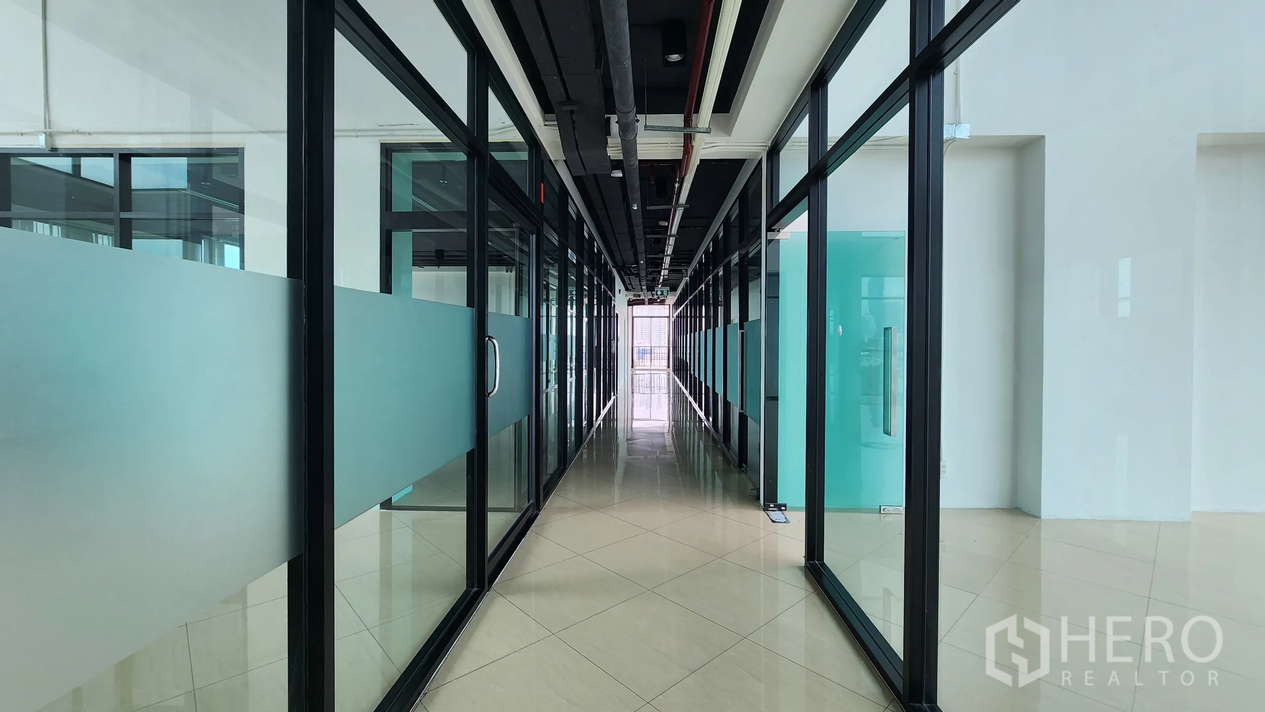 Office Space for rent in Yan Nawa, Bangkok - Carpeted meeting room with curtains and wood feature ceiling, skyline view.