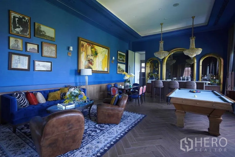 Detached House for sale in Bang Kapi, Bangkok - Entertainment room with blue walls, bar, and pool table.