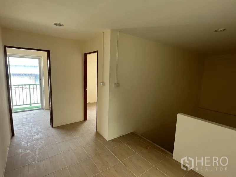 Warehouse for rent in Pathum Thani - Industrial electrical control panel mounted on the warehouse wall.