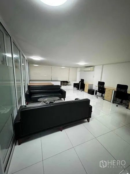 Home Office for rent or sale in Bang Phli, Samut Prakan - White tiled workspace with desks, office chairs and sofas.