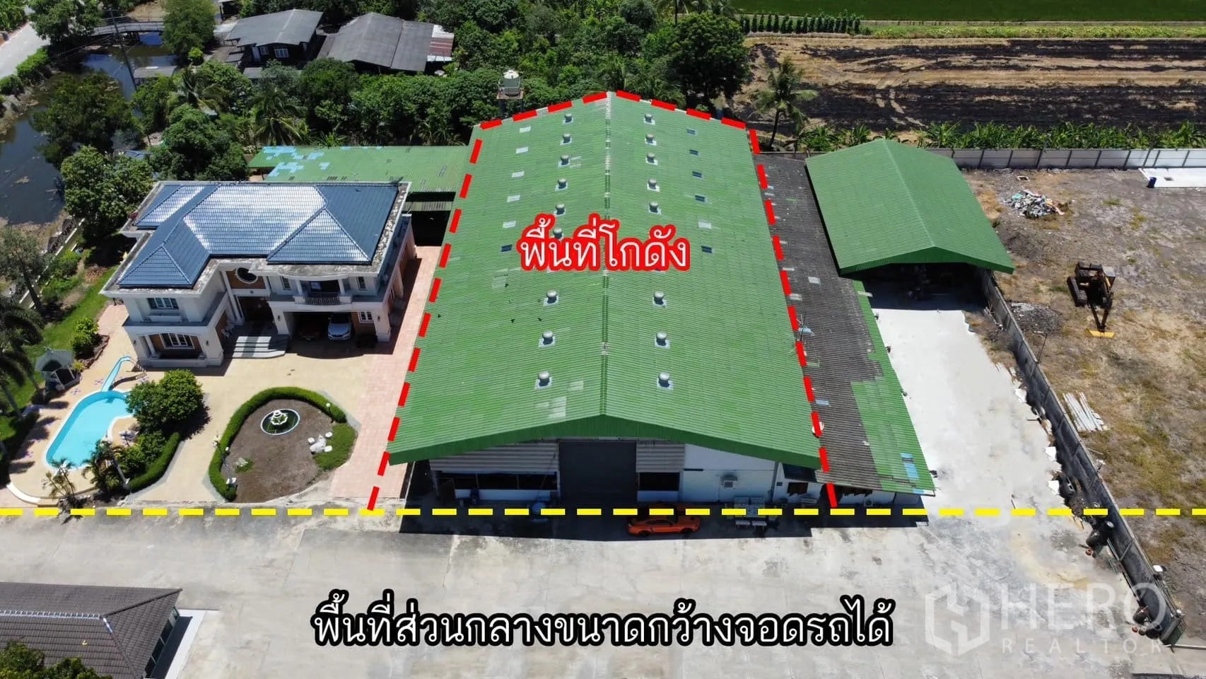 Warehouse for rent in Sai Noi, Nonthaburi - Aerial view marking the warehouse footprint beside a residence and landscaped grounds.