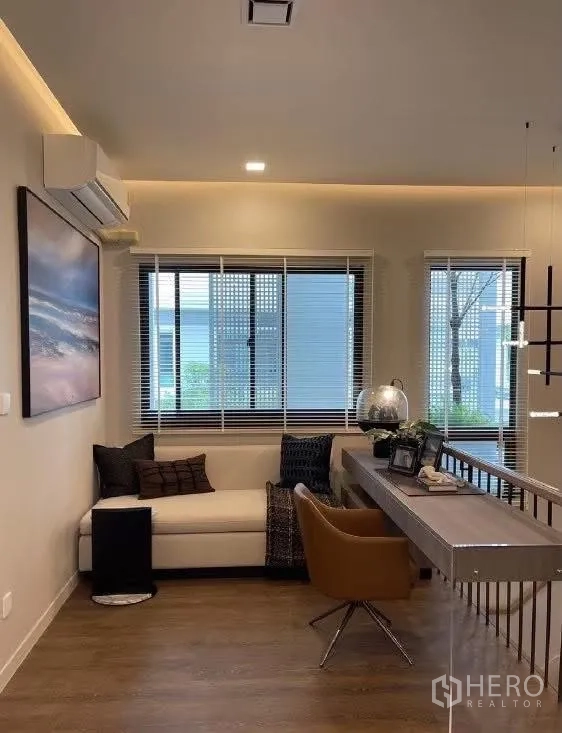 Detached House for rent in Bang Phli, Samut Prakan - Another angle of landing workspace with sofa and desk by windows.