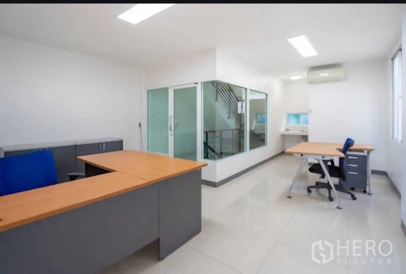 Home Office for rent or sale in Lat Krabang, Bangkok - Spacious office floor featuring glass partitions and air conditioning.