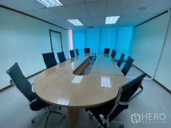 Office Space for rent in Huai Khwang, Bangkok - Conference room with long oval meeting table and black executive chairs.