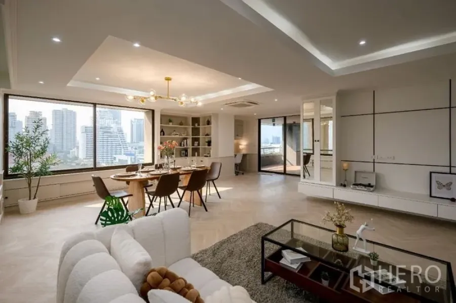 Condominium for sale - Open-plan lounge with built-in wall unit and access to the terrace.