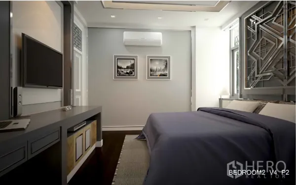 Detached House for rent in Bang Kapi, Bangkok - Bedroom view to TV wall, split air conditioner and framed black-and-white artworks.