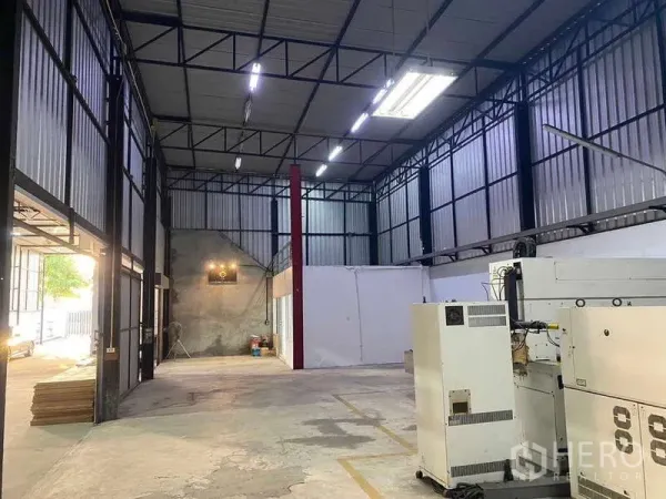Warehouse for sale in Mueang Samut Prakan, Samut Prakan - Industrial workspace with partitioned office, bright LED lighting and power supply.