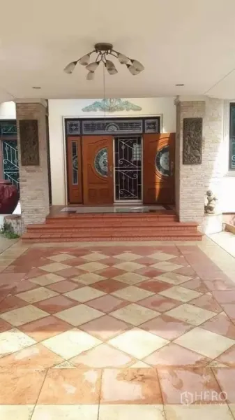 Detached House for sale in Bueng Kum, Bangkok - Grand front entrance with double wooden doors and tiled porch.