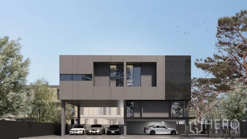 Home Office for sale in Prawet, Bangkok - Modern three-storey home office facade with cantilevered upper floors and covered multi-car parking.