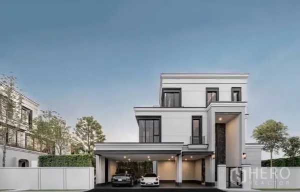 บ้าน ให้เช่า - ภาพด้านหน้าบ้านเดี่ยว 3 ชั้น ที่จอดรถในร่มและแนวรั้วเรียบร้อย