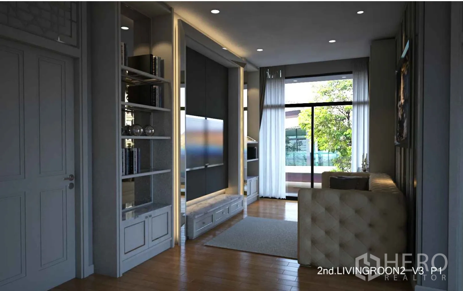 Detached House for rent in Bang Kapi, Bangkok - Upstairs family lounge with shelving and sliding glass doors opening to a balcony and greenery.