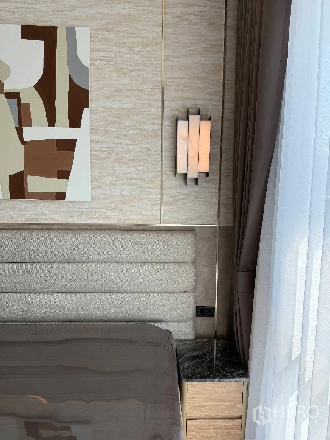 Detached House for rent in Bang Phli, Samut Prakan - Close-up of bedside wall sconce and curtain beside the headboard.
