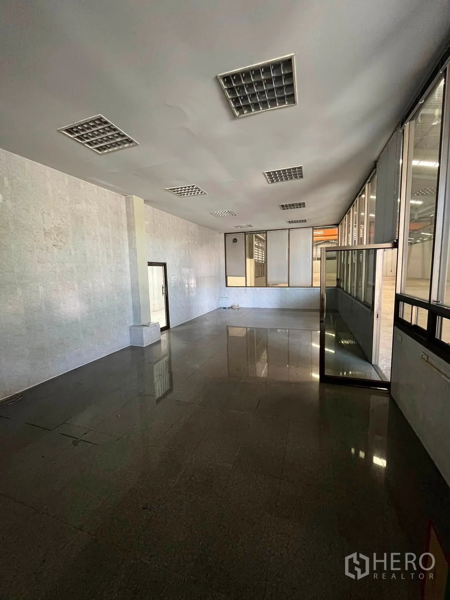 Warehouse for rent in Bang Phli, Samut Prakan - Another internal office room with windows overlooking the warehouse floor.