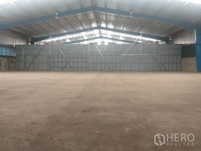 Warehouse for rent in Pathum Thani - Large internal metal sliding partition doors inside the warehouse.