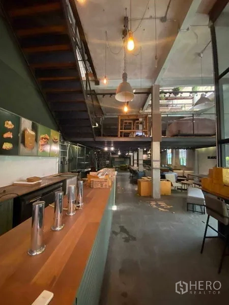 Retail Space for rent in Bang Na, Bangkok - Service counter and bar facing an open double-height retail space