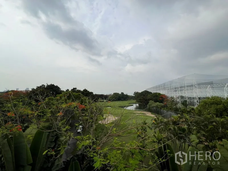 Townhouse for rent in Bang Kapi, Bangkok - View over driving range and landscaped greenery from upper floor.