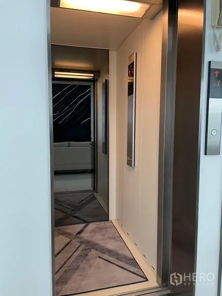 Detached House for rent in Bueng Kum, Bangkok - Private residential elevator with stainless-steel frame and lit interior.