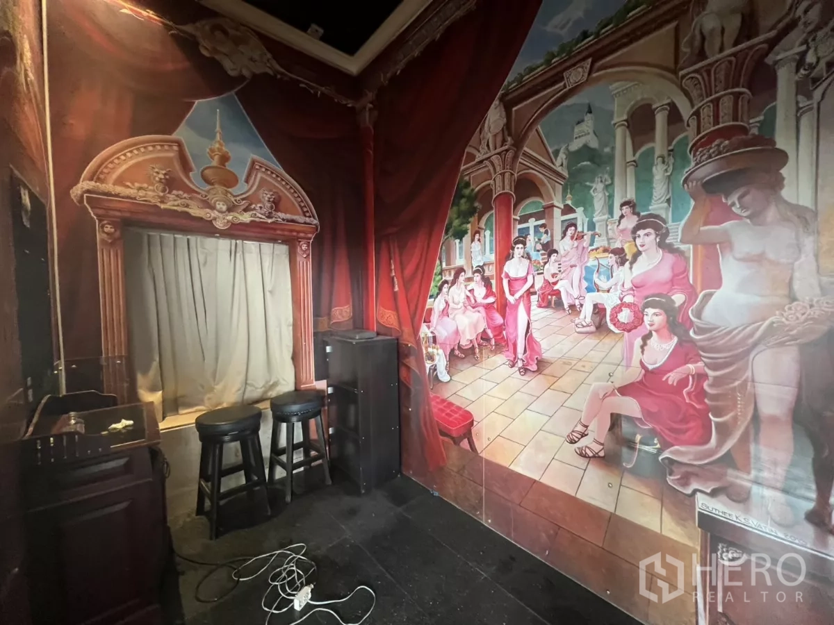 Retail Space for rent in Watthana, Bangkok - Room with classical mural artwork, bar stools and cabinet.