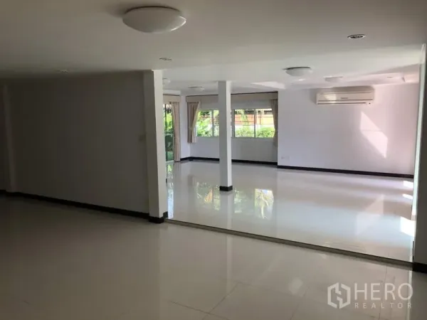 Detached House for rent in Suan Luang, Bangkok - Bright secondary living space with large windows, sliding doors and air conditioning