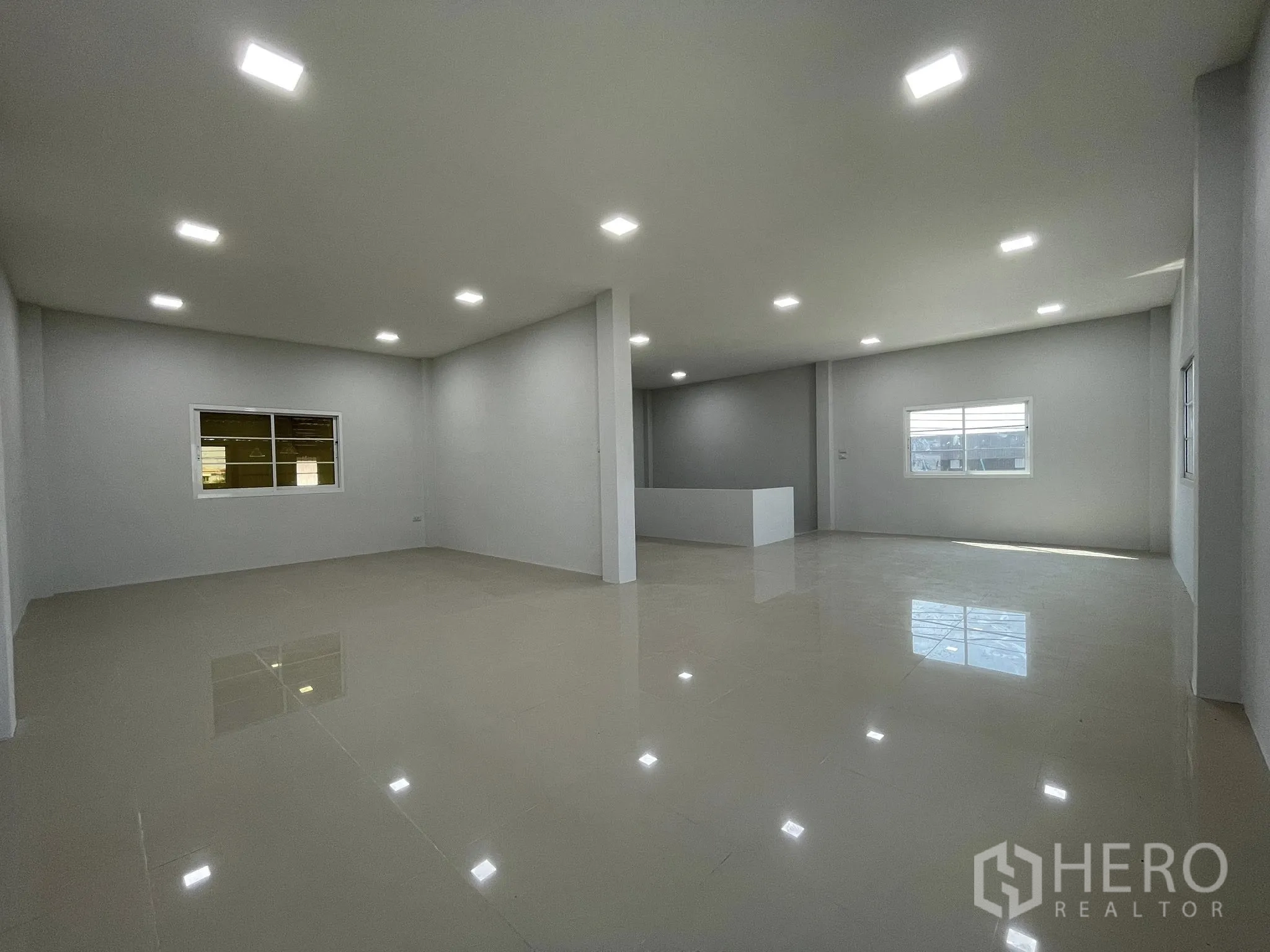 Factory for rent or sale in Bang Phli, Samut Prakan - Another view of the upstairs office showing windows and an open layout.