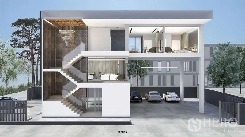 Home Office for sale in Prawet, Bangkok - Architectural section revealing the staircase, double-height lobby and upper-level living areas over covered parking.