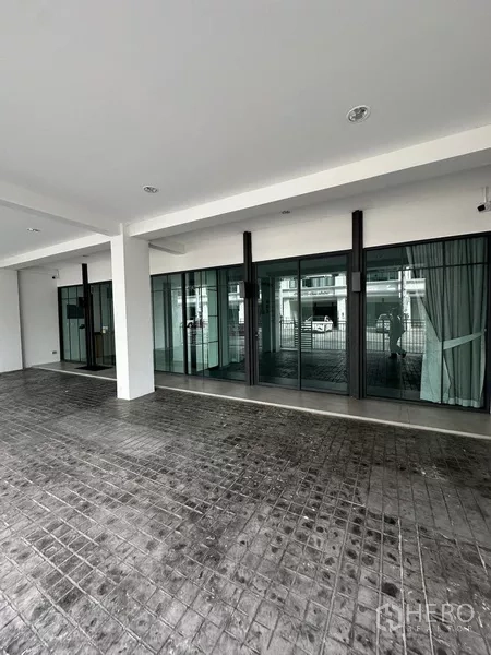 Home Office for rent - Covered ground-level frontage with full-height glass doors and security cameras.