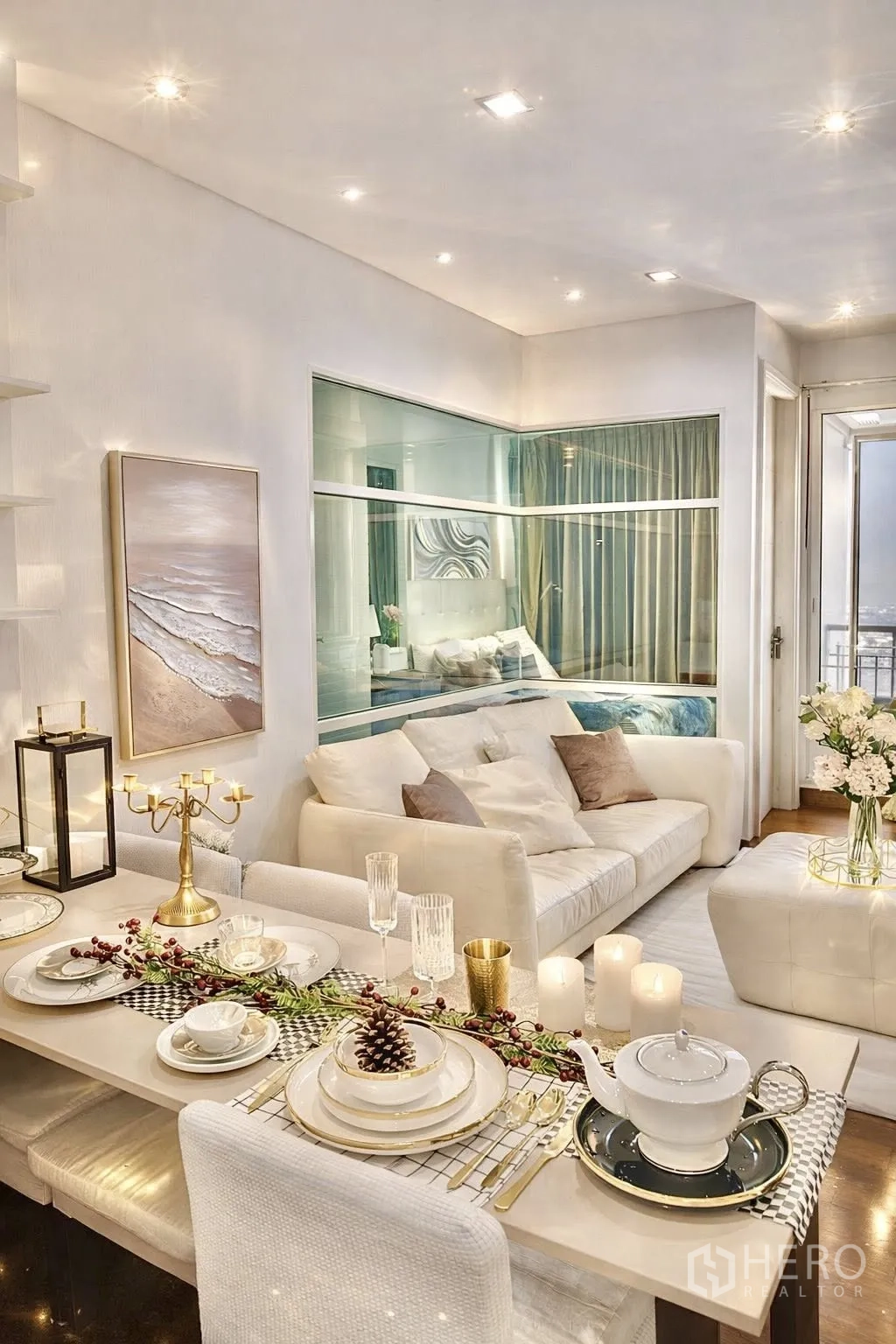 Condominium for rent or sale in Watthana, Bangkok - Elegant dining table set with tableware and candles next to the sofa.