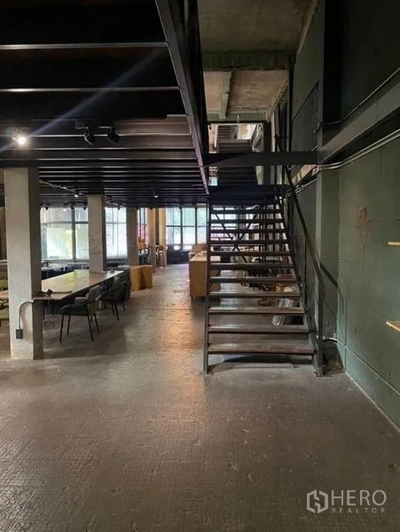 Retail Space for rent in Bang Na, Bangkok - Metal staircase in a warehouse-style interior leading to the upper floor