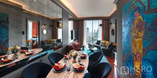 Condominium for sale in Watthana, Bangkok - Stylish Thonglor condo dining and living area with a marble table, mirrored wall, and city‑view windows.