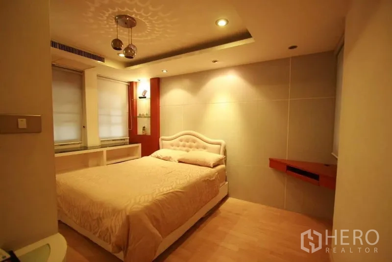 Detached House for rent in Bang Phli, Samut Prakan - Warm bedroom with tray ceiling, soft lighting and an upholstered headboard.