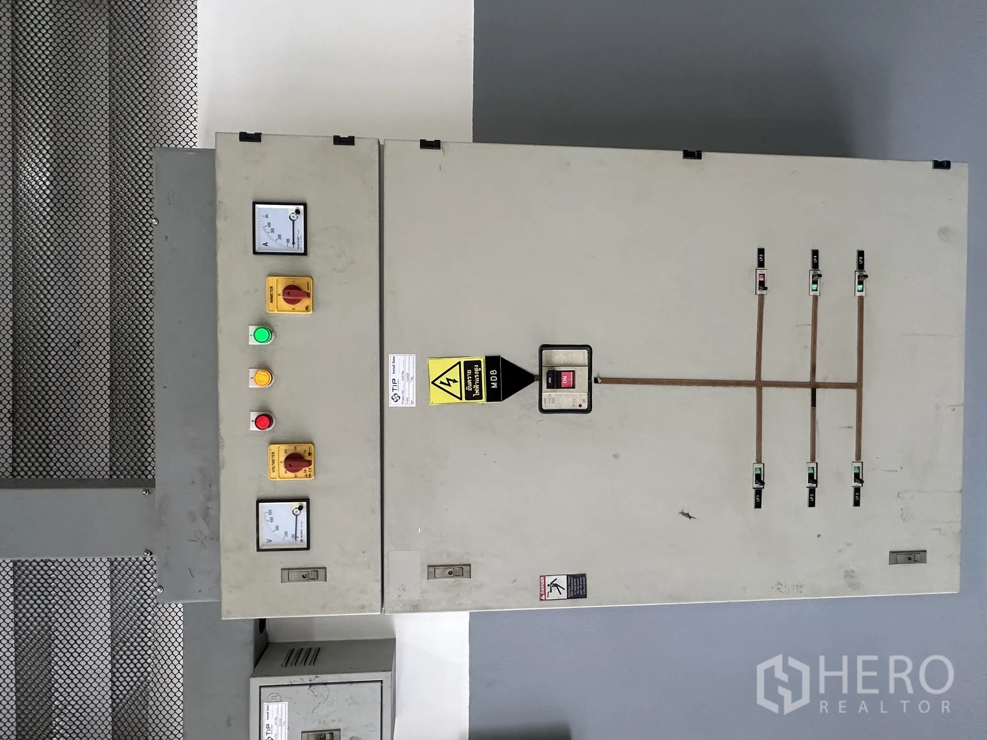 Factory for rent in Bang Phli, Samut Prakan - Electrical control panel with gauges and emergency stop buttons.