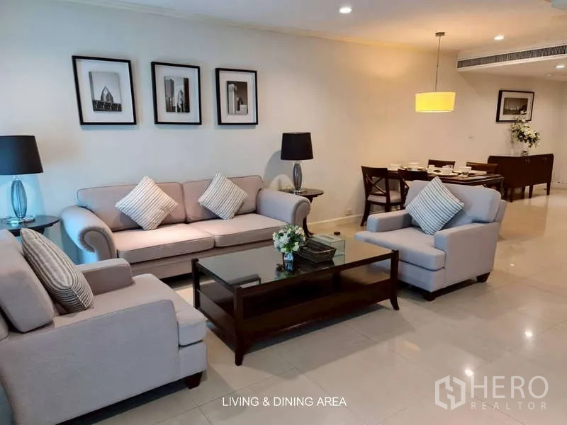 พื้นที่ขายปลีก ให้เช่าในWatthana, Bangkok - พื้นที่นั่งเล่นและทานอาหารพร้อมชุดโซฟาและโต๊ะอาหารหกที่นั่ง