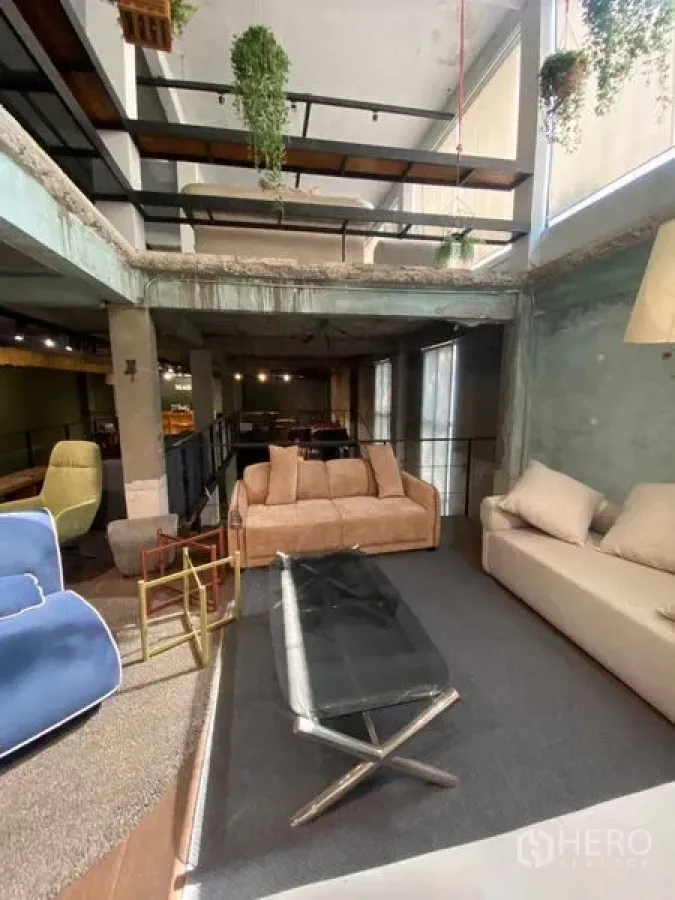 Retail Space for rent in Bang Na, Bangkok - Loft mezzanine lounge with sofas and a skylight-style opening