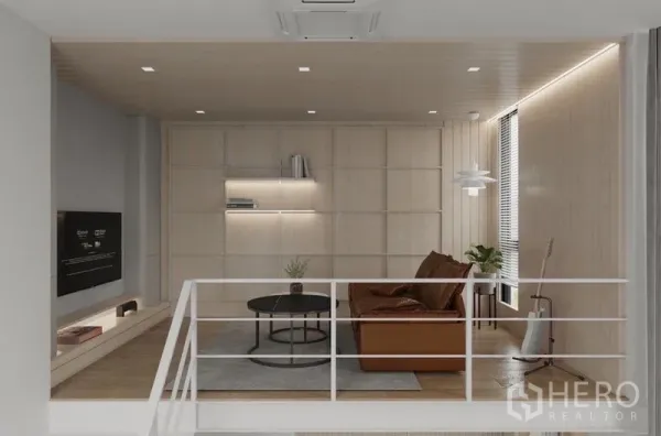 บ้าน ให้เช่าในSaphan Sung, Bangkok - ห้องนั่งเล่นชั้นลอย โซฟาหนัง ผนังไม้บิวท์อินและชั้นวางของ