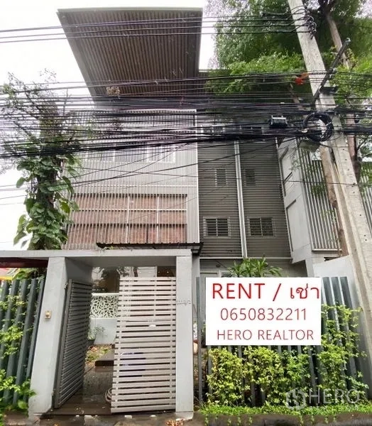 Home Office for rent or sale in Suan Luang, Bangkok - Modern multi‑storey home office exterior with gated entrance and a rent sign in Suan Luang, Bangkok.