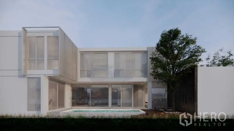 ที่ดิน ขายในPrawet, Bangkok - ด้านหลังอาคารผนังกระจกเต็มบาน มองเห็นสระส่วนตัวและสวน.