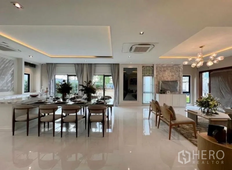 Detached House for sale in Bang Phli, Samut Prakan - Spacious open living–dining pavilion with glossy floors and wide windows.