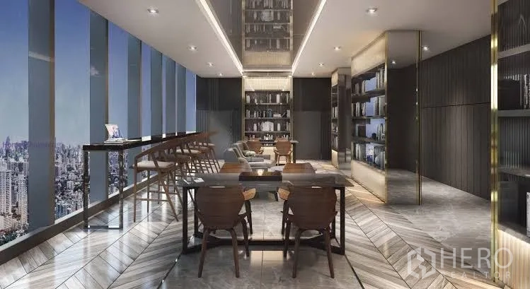 คอนโด ให้เช่าในHuai Khwang, Bangkok - ห้องสมุดและโคเวิร์คกิ้งเลานจ์ โต๊ะยาว บาร์นั่ง และวิวสกายไลน์