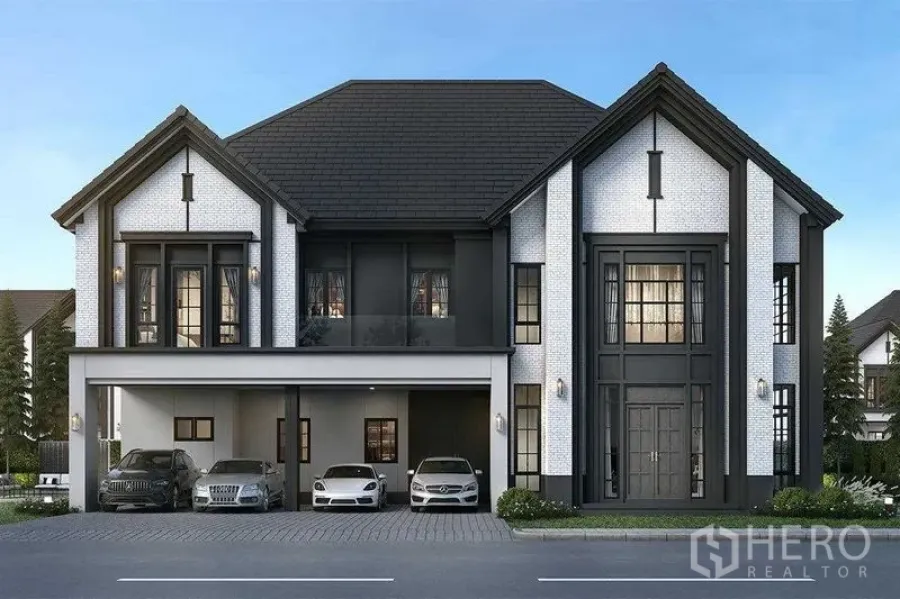 Detached House for sale in Bang Phli, Samut Prakan - Front elevation of modern detached home with double-height entrance and tall grid windows.